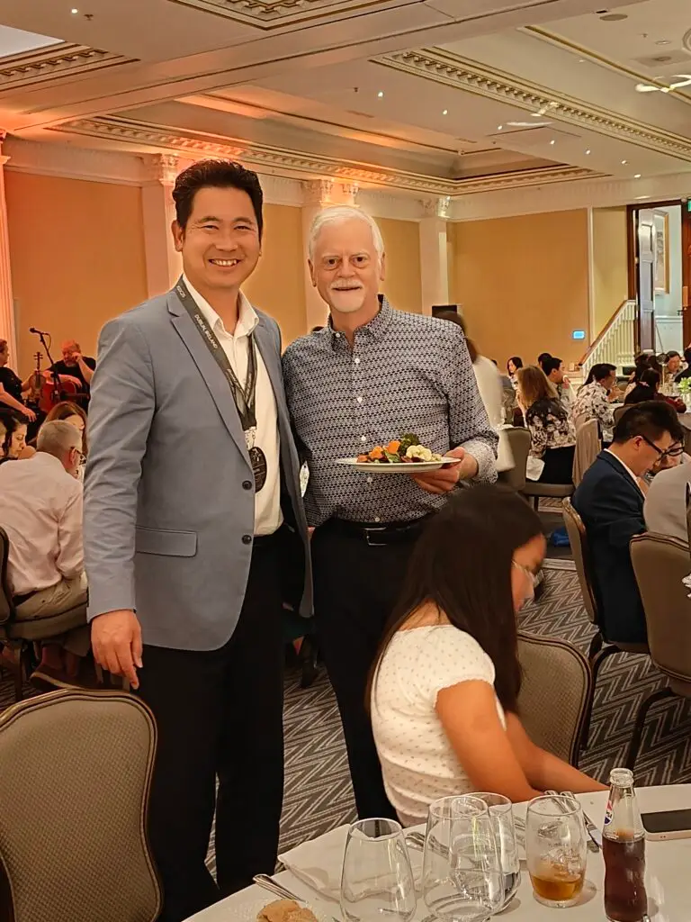 Co Founder of M&M Wealth Associates, Matthew Wu photographed with CEO of FFS.