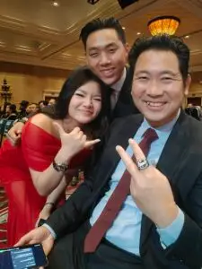 Co Founder of M&M Wealth Associates, Matthew Wu selfie with other financial advisors.