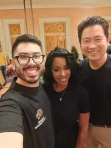Co Founders of M&M Wealth Associates, Michael Henry and Matthew Wu photographed with financial advisor.